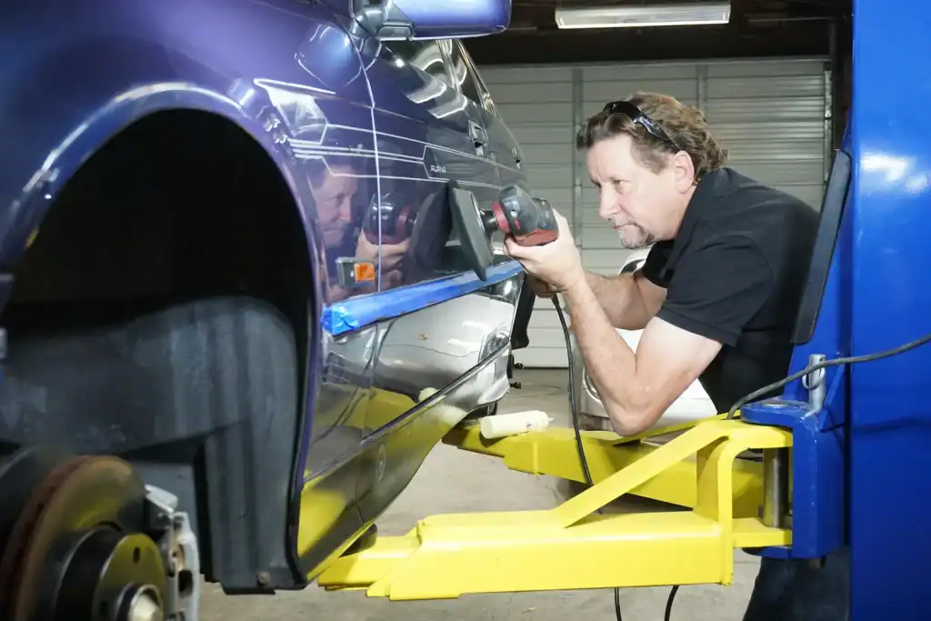 Sean Woodward - Apollo Auto Spa - Polishing an intricate BMW Alpina B3 door panel